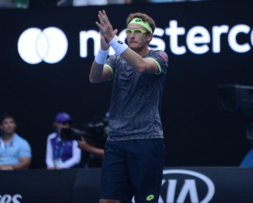 Denis Istomin of Uzbekistan celebrates winning his second round match against Novak Djokovic of Serbia on day four of the 2017 Australian Open at Melbourne Park on January 19, 2017 in Melbourne, Australia.