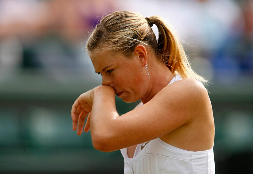 Russia's Maria Sharapova gestures as she plays against compatriot Alla Kudryavtseva on the fourth day of the 2008 Wimbledon Championships at the All England Tennis Club in south-west London, on June 26, 2008.