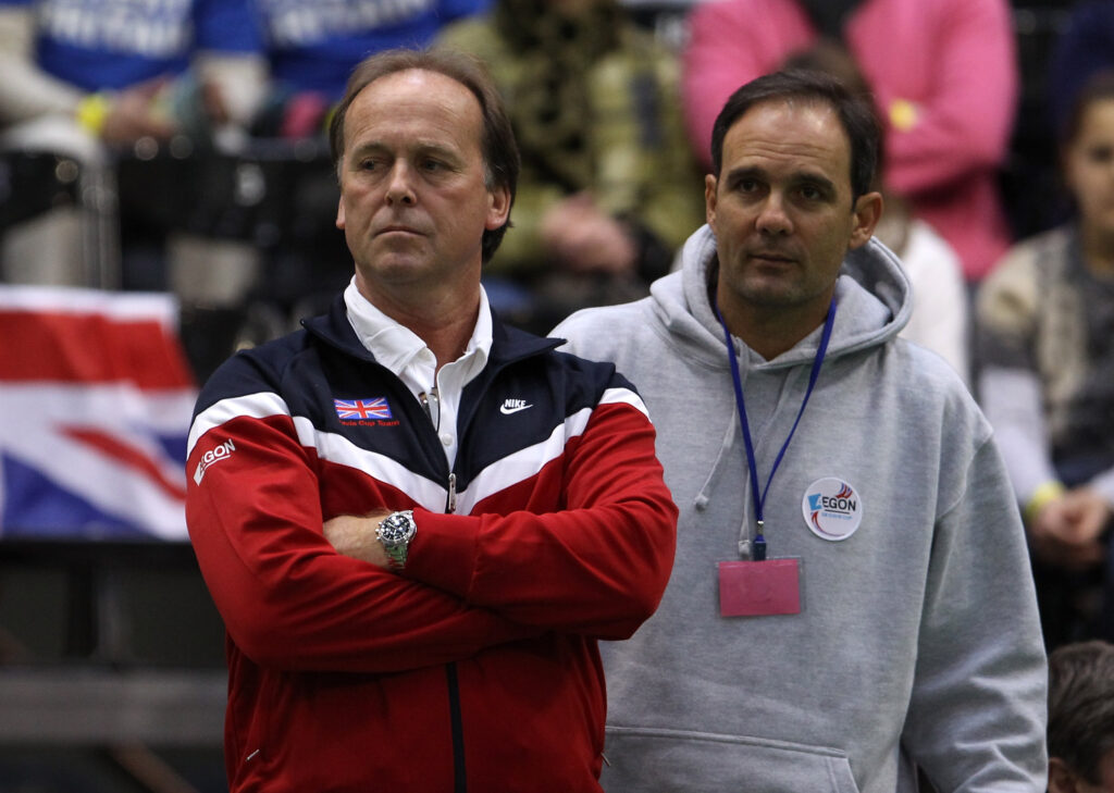 Captain John Lloyd and LTA coach Paul Annacone look on as Dan Evans of Great Britain is in action against Ricardas Berankis of Lithuania during day one of the Davis Cup Tennis match between Lithuania and Great Britain at the SEB Arena on March 5, 2010 in Vilnius, Lithuania.