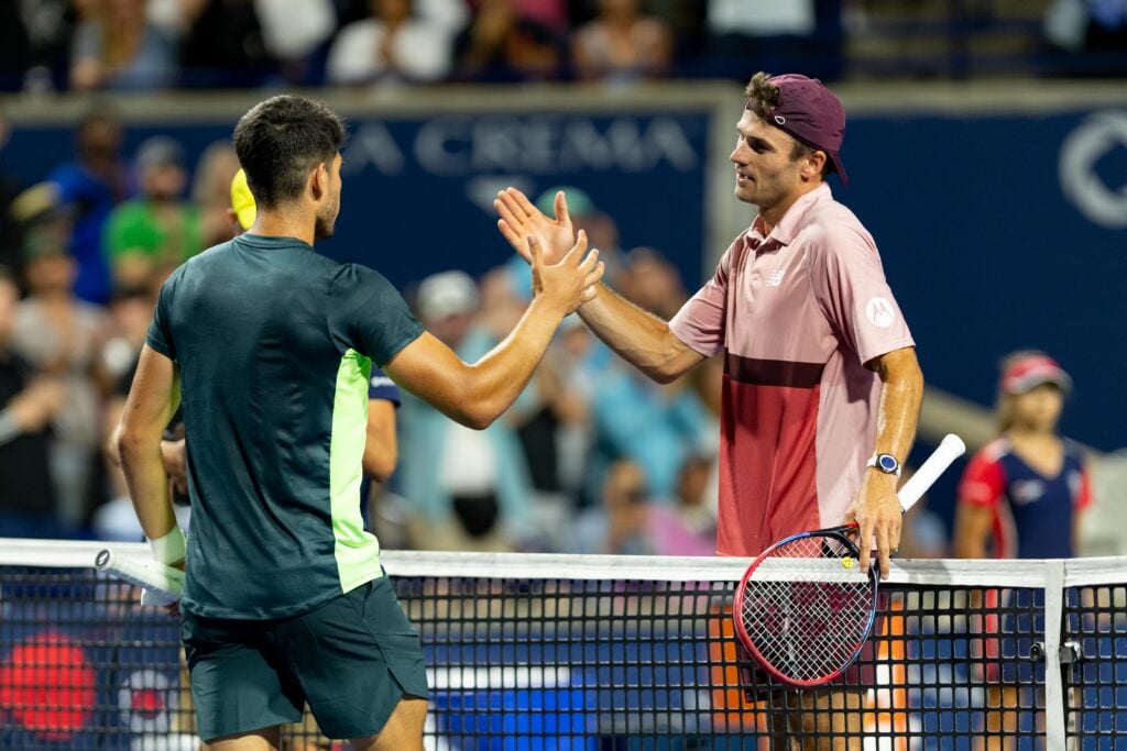 Tommy Paul of the United States shake hands with Carlos Alcaraz of Spain after winning his quarter-final match of the National Bank Open, part of the Hologic ATP Tour, at Sobeys Stadium on August 11, 2023 in Toronto, Canada.
