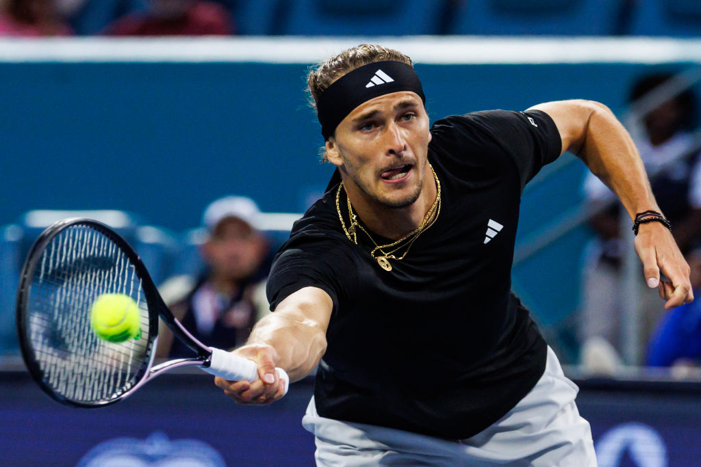 Alexander Zverev of Germany hits a forehand volley against Grigor Dimitrov of Bulgaria in the semi-finals of the Miami Open at the Hard Rock Stadium on March 29, 2024 in Miami Gardens, Florida.