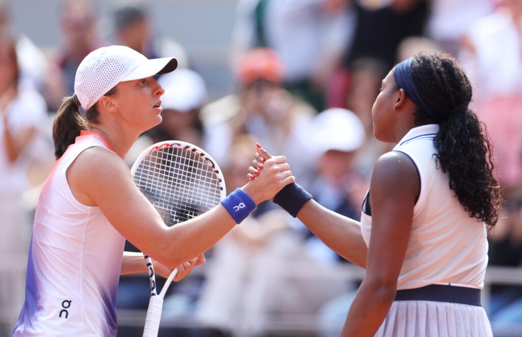Iga Swiatek of Poland shakes hands with Coco Gauff of United States after the Women's Singles Semi-Final match on Day 12 at Roland Garros on June 06, 2024 in Paris, France.