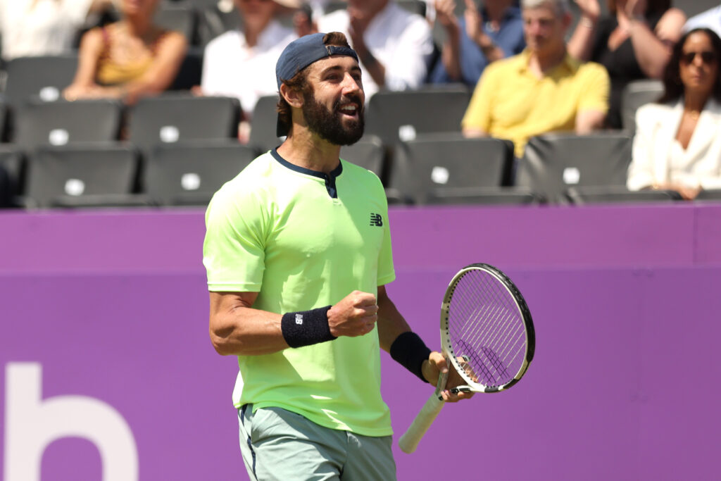 Jordan Thompson of Australia celebrates winning match point against Taylor Fritz of United States following the Men's Singles Quarter Final match on Day Five of the cinch Championships at The Queen's Club on June 21, 2024 in London, England.