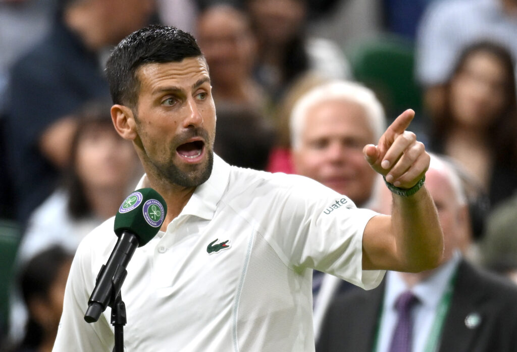 Novak Djokovic of Serbia addresses the crowd on Centre Court following victory against Holger Rune of Denmark in his Gentlemen's Singles fourth round match during day eight of The Championships Wimbledon 2024 at All England Lawn Tennis and Croquet Club on July 08, 2024 in London, England.