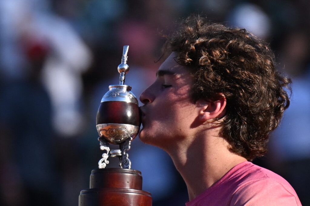 Brazil's Joao Fonseca celebrates with the trophy after defeating Argentina's Francisco Cerundulo in the ATP 250 Argentina Open singles final tennis match in Buenos Aires on February 16, 2025.