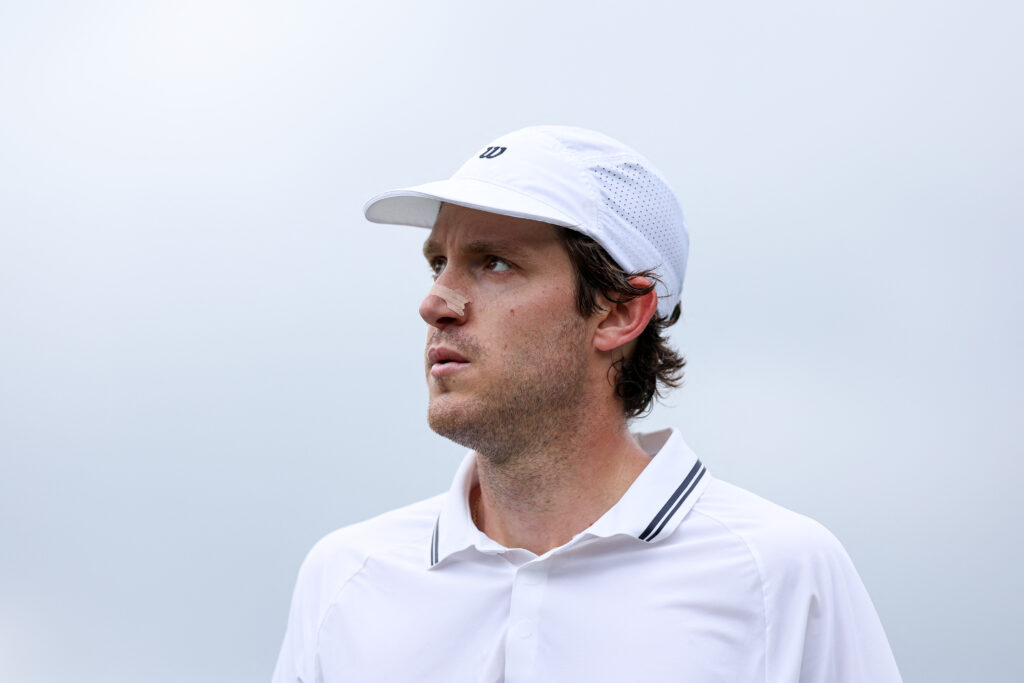 Chile's Nicolas Jarry looks on as he plays against US player Learner Tien during their men's singles second round tennis match on the third day of the 2025 Wimbledon Championships at The All England Lawn Tennis and Croquet Club in Wimbledon, southwest London, on July 2, 2025.