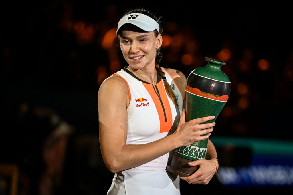 Kazakhstan's Elena Rybakina poses with the trophy after her victory against Russia's Ekaterina Alexandrova during their women's singles final match at the WTA Ningbo Open tennis tournament in Ningbo, in China's eastern Zhejiang province on October 19, 2025.