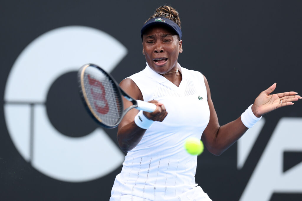 Venus Williams of USA plays a forehand shot in her match against Magda Linette of Poland during day two during day of the 2025 ASB Classic at ASB Tennis Centre on January 06, 2026 in Auckland, New Zealand.