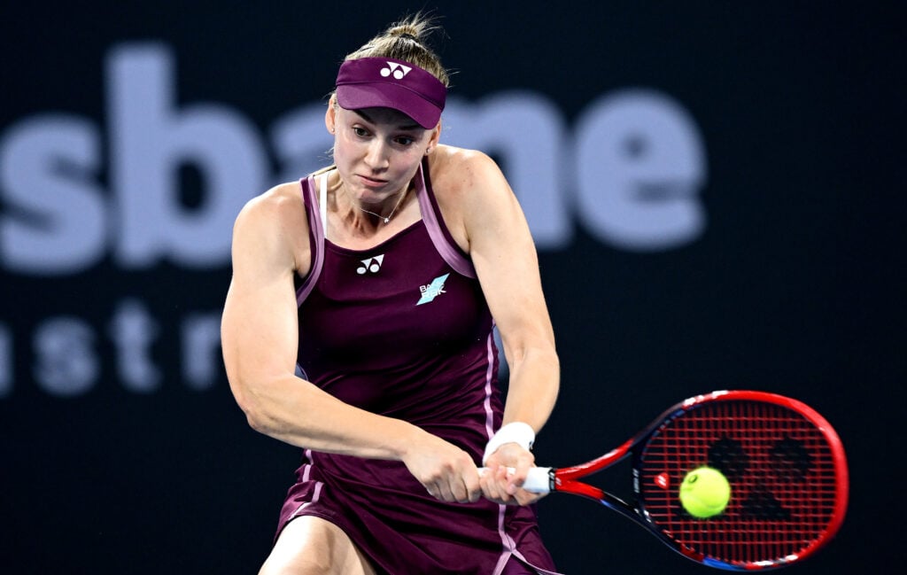 Elena Rybakina of Kazakhstan plays a backhand in the women’s singles match against Shuai Zhang of China during the 2026 Brisbane International at Pat Rafter Arena on January 06, 2026 in Brisbane, Australia.