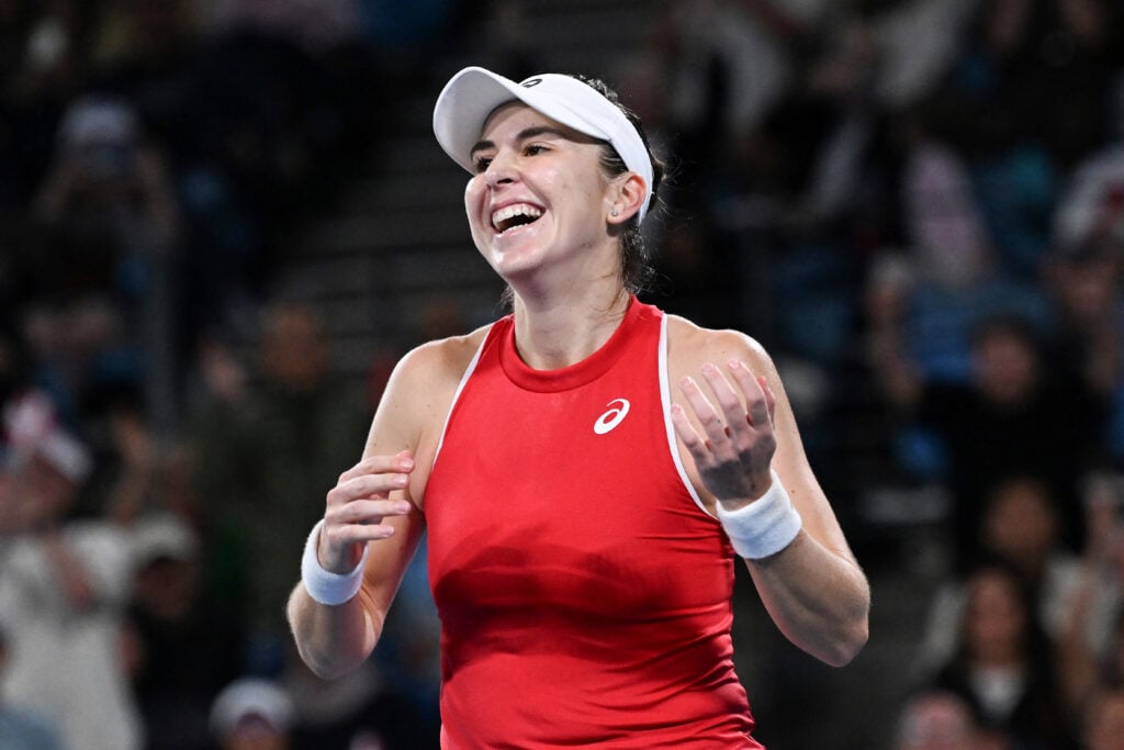 Switzerland's Belinda Bencic celebrates after defeating Poland's Iga Swiatek during their women's singles match during the final at the United Cup tennis tournament in Sydney on January 11, 2026.