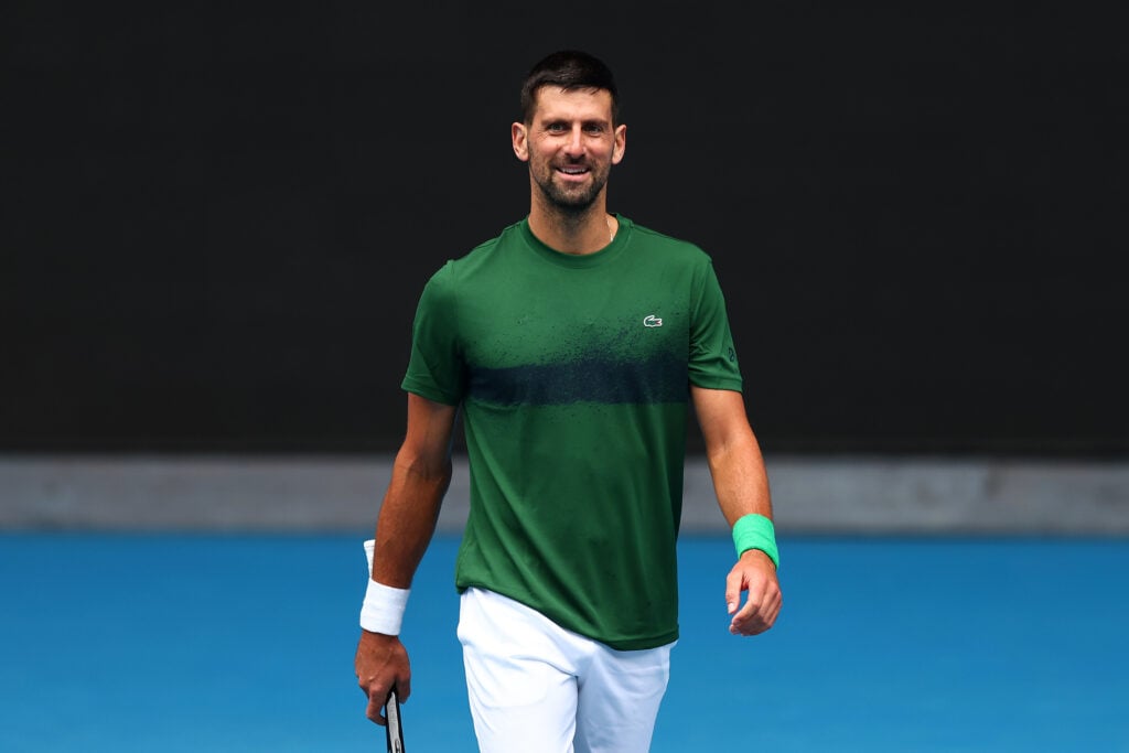 Novak Djokovic of Serbia smiles during a practice session ahead of the 2026 Australian Open at Melbourne Park on January 14, 2026 in Melbourne, Australia.