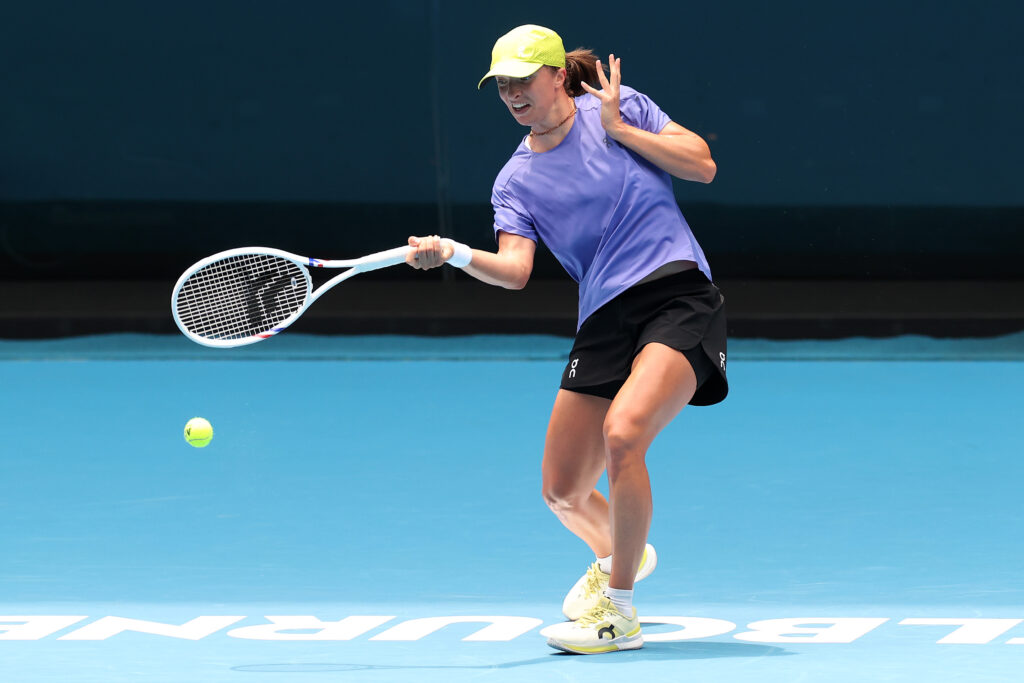 Iga Swiatek of Poland plays a forehand during a practice session ahead of the 2026 Australian Open at Melbourne Park on January 15, 2026 in Melbourne, Australia.