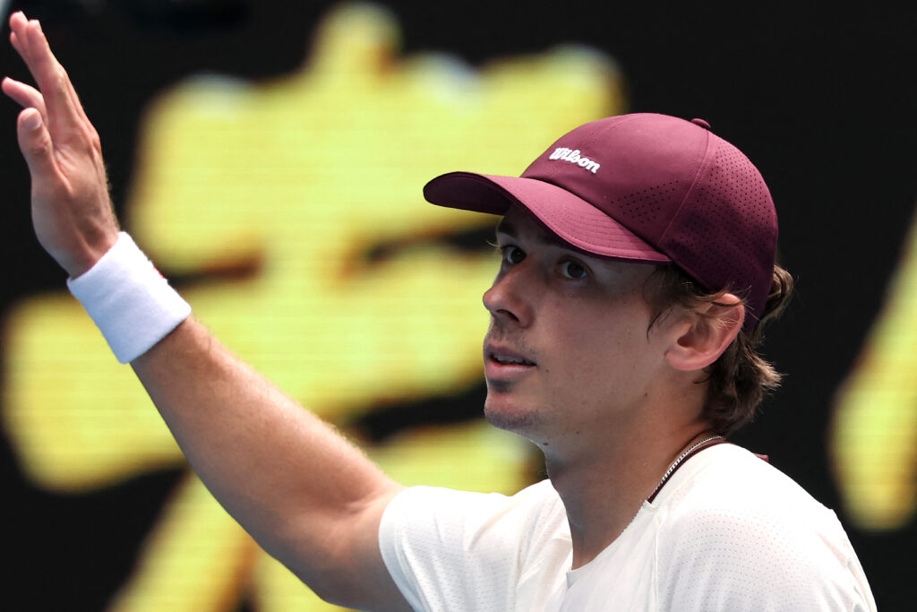 Alex de Minaur waves to the crowd