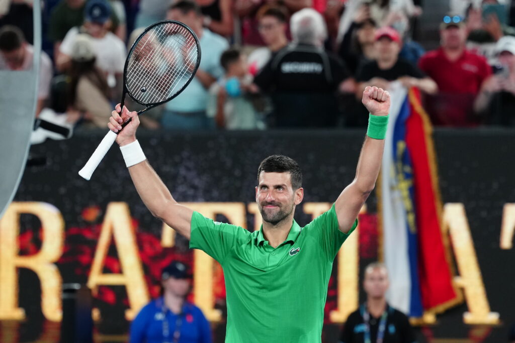 Novak Djokovic of Serbia celebrates his victory Pedro Martinez of Spain in the Men's Singles First Round during day two of the 2026 Australian Open at Melbourne Park on January 19, 2026 in Melbourne, Australia.