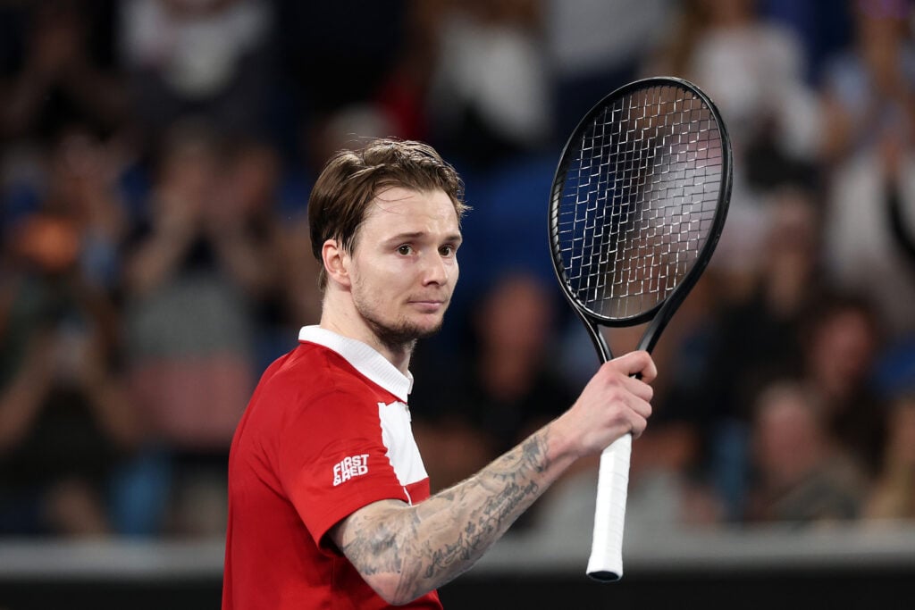 Alexander Bublik of Kazakhstan celebrates victory over Jenson Brooksby of United States following the Men's Singles First Round match on day one of the 2026 Australian Open at Melbourne Park on January 18, 2026 in Melbourne, Australia.