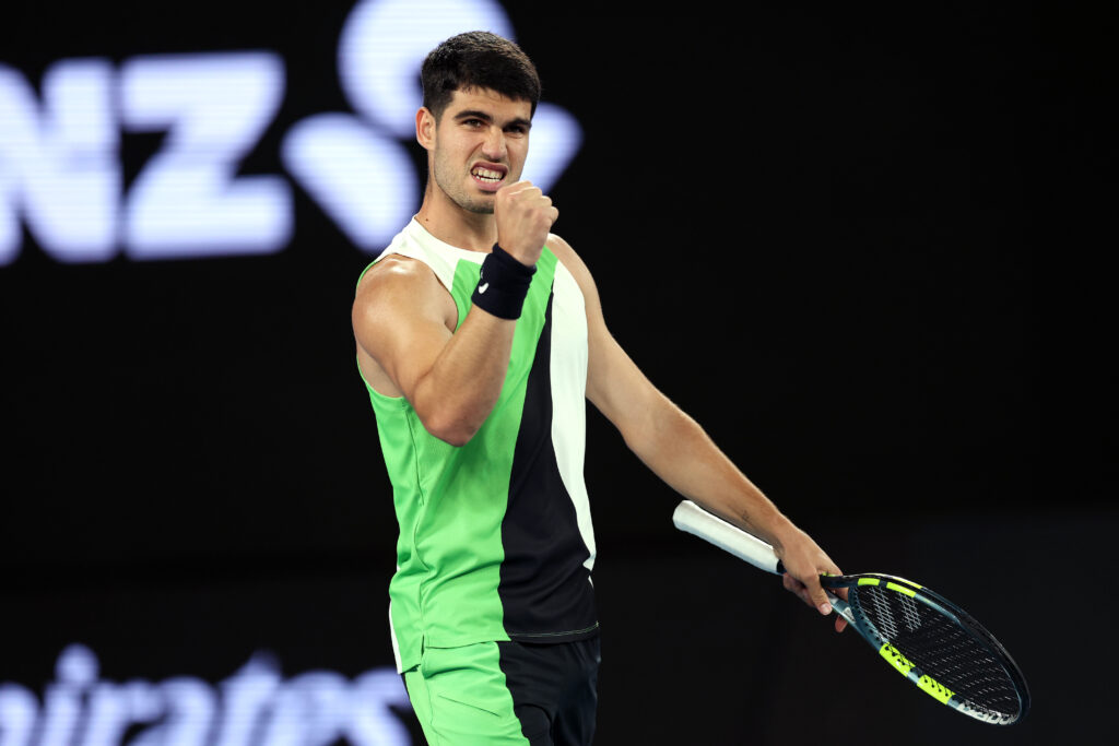 Carlos Alcaraz of Spain celebrates victory over Adam Walton of Australia during the Men's Singles First Round match on day one of the 2026 Australian Open at Melbourne Park on January 18, 2026 in Melbourne, Australia.