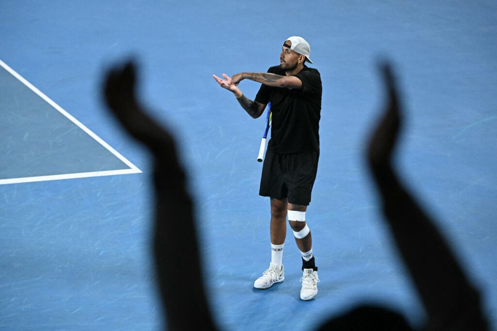 Australia's Nick Kyrgios gestures during his men's doubles match against compatriot Jason Kubler and Marc Polmans on day five of the Australian Open tennis tournament in Melbourne on January 22, 2026.