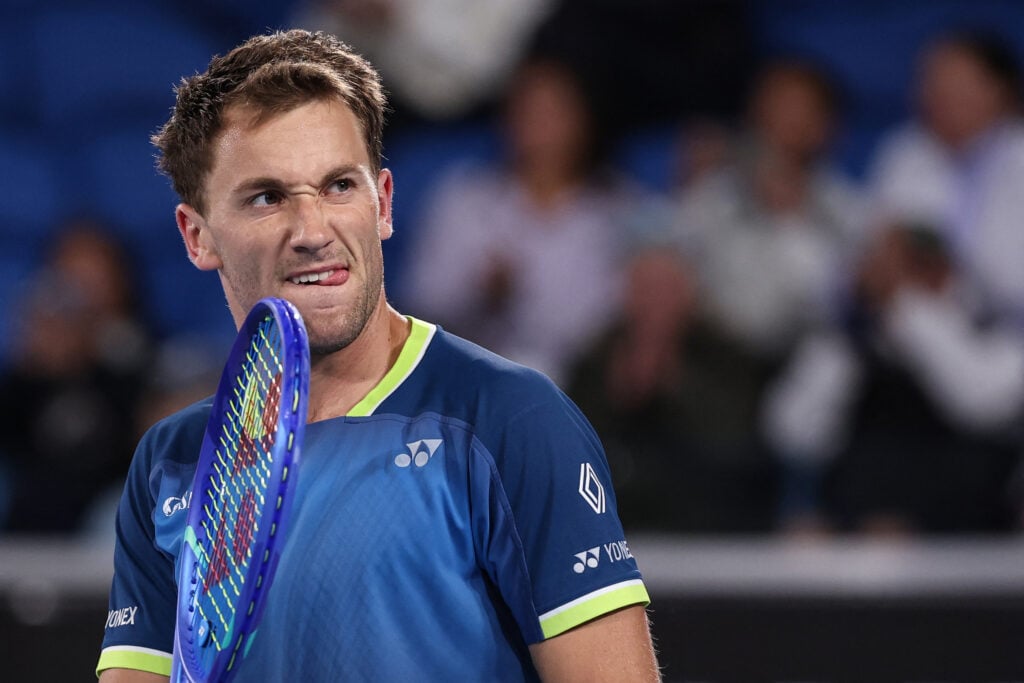 Norway's Casper Ruud reacts after the match point against Spain's Jaume Munar during their men's singles match on day five of the Australian Open tennis tournament in Melbourne on January 22, 2026.