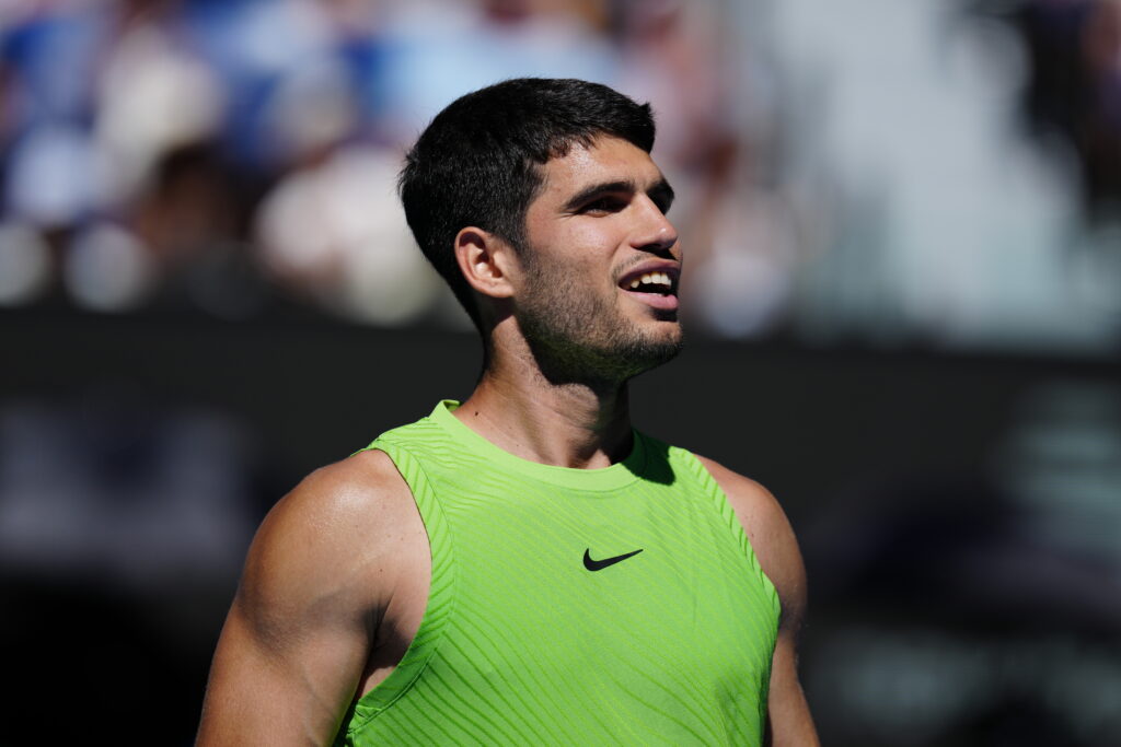 Carlos Alcaraz of Spain reacts during a match against Corentin Moutet of France in the Men's Singles Third Round during day six of the 2026 Australian Open at Melbourne Park on January 23, 2026 in Melbourne, Australia.
