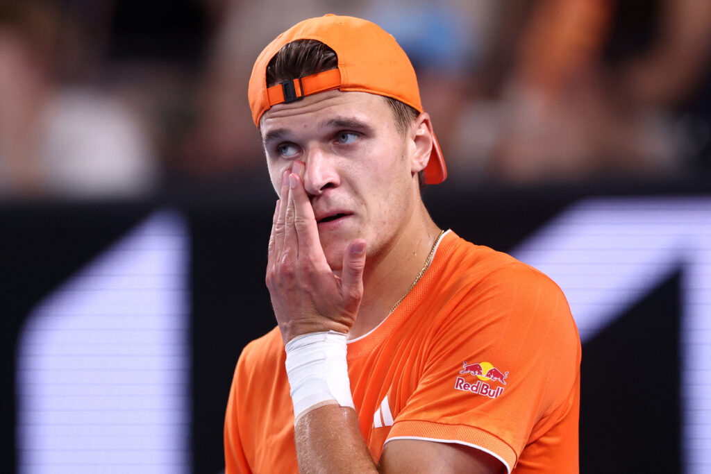 Czech Republic's Jakub Mensik reacts after a point against USA's Ethan Quinn during their men's singles match on day seven of the Australian Open tennis tournament in Melbourne on January 24, 2026.