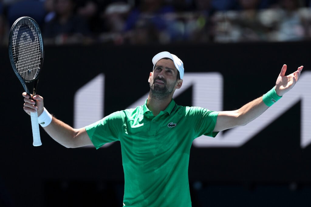 Novak Djokovic of Serbia reacts in the Men's Singles Second Round against Francesco Maestrelli of Italy during day five of the 2026 Australian Open at Melbourne Park on January 22, 2026 in Melbourne, Australia.