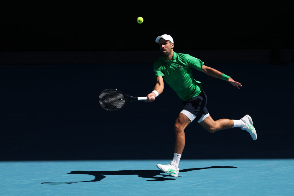 Novak Djokovic runs after the ball