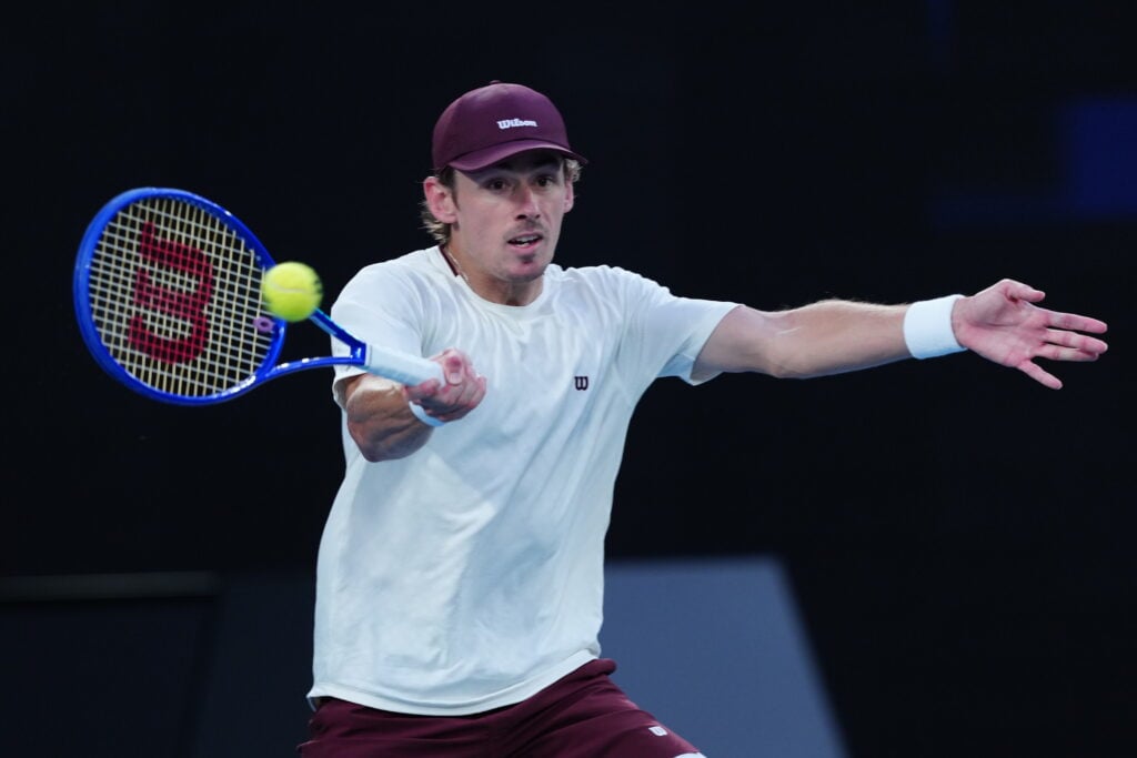 Alex de Minaur of Australia returns a shot in the Men's Singles Fourth Round against Alexander Bublik of Kazakhstan during day eight of the 2026 Australian Open at Melbourne Park on January 25, 2026 in Melbourne, Australia.