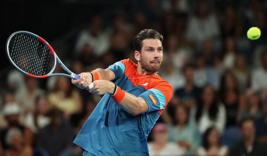 Cam Norrie hits a backhand