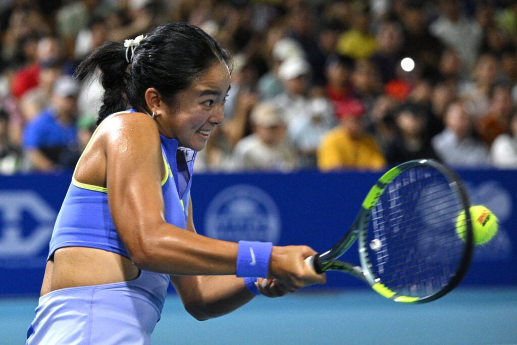 Philippines' Alexandra Eala hits a return to Russia's Alina Charaeva during their women's singles match at the Philippine Women's Open tennis tournament in Manila on January 26, 2026.