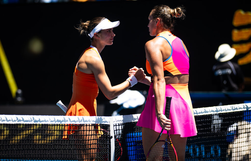 Iva Jovic of the United States and Aryna Sabalenka shake hands at the net after the quarter-final on Day 10 of the 2026 Australian Open at Melbourne Park on January 27, 2026 in Melbourne, Australia
