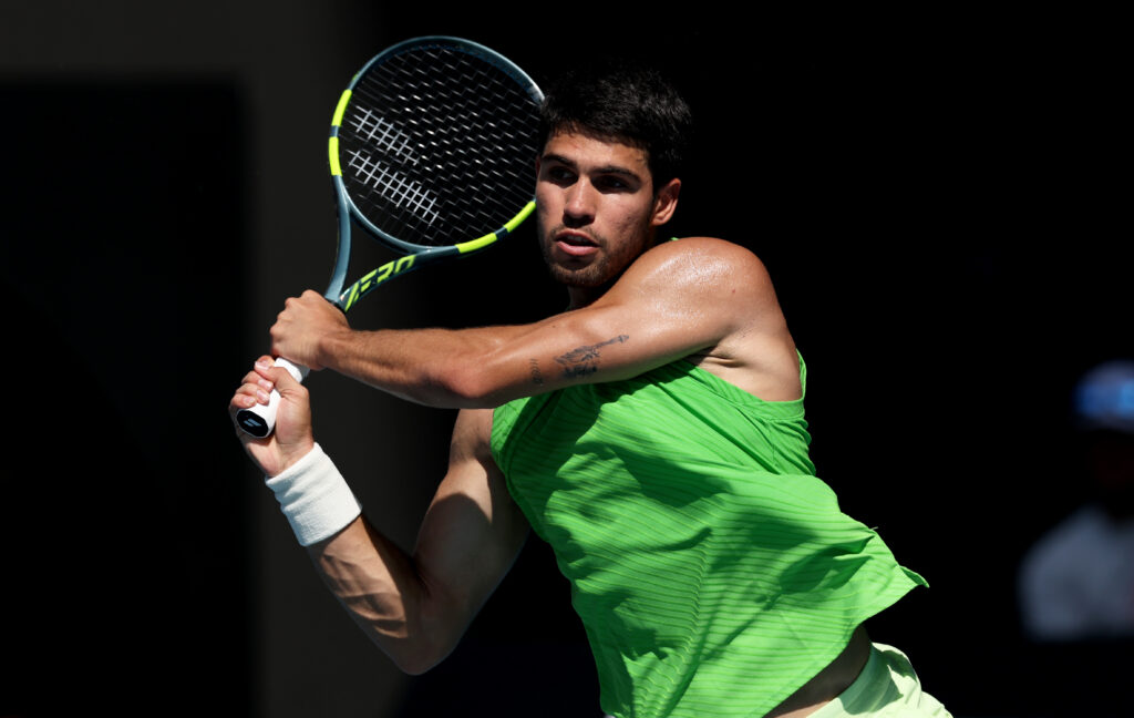 Carlos Alcaraz of Spain plays a backhand in the men's Singles Fourth Round against Tommy Paul of the United States during day eight of the 2026 Australian Open at Melbourne Park on January 25, 2026 in Melbourne, Australia.