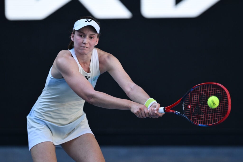 Elena Rybakina of Kazakhstan plays a backhand in the Women's Singles Fourth Round against Elise Mertens of Belgium during day nine of the 2026 Australian Open at Melbourne Park on January 26, 2026 in Melbourne, Australia.