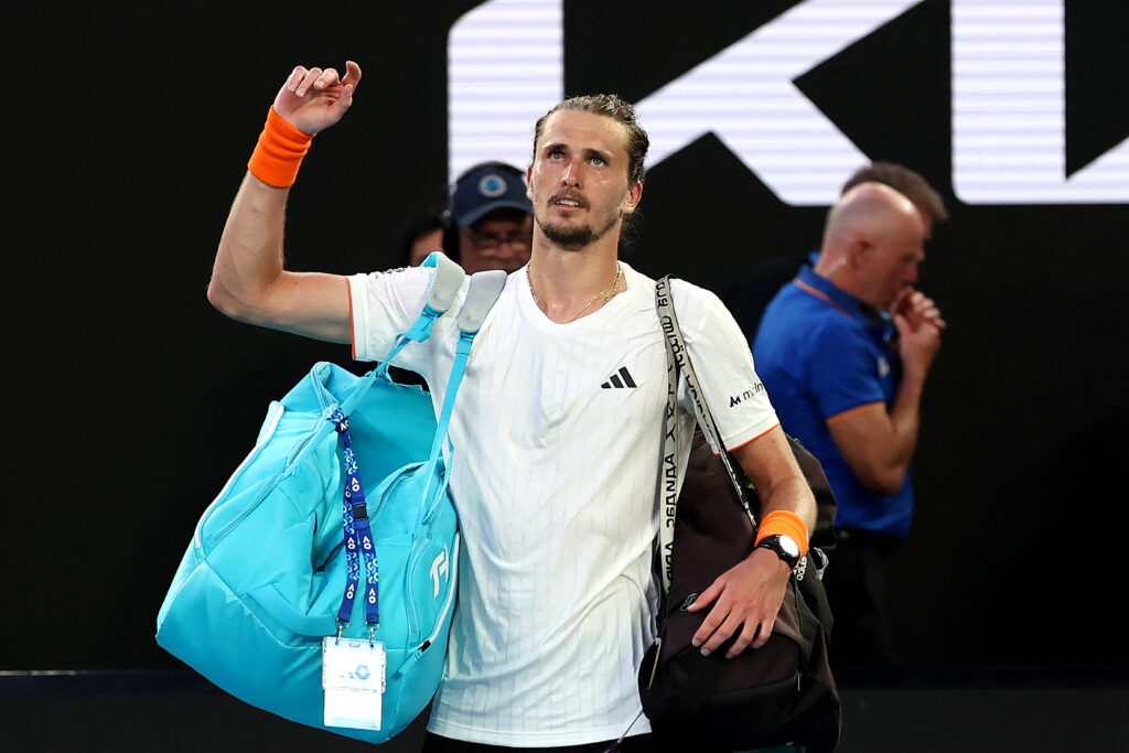 Germany's Alexander Zverev walks off the court after his loss to Spain's Carlos Alcaraz in their men's singles semi-final on day thirteen of the Australian Open tennis tournament in Melbourne on January 30, 2026.
