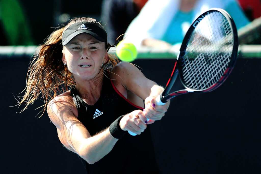 Daniela Hantuchova of Slovakia plays a backhand against Sara Errani of Italy during day one of the 2015 ASB Classic at ASB Tennis Centre on January 5, 2015 in Auckland, New Zealand.