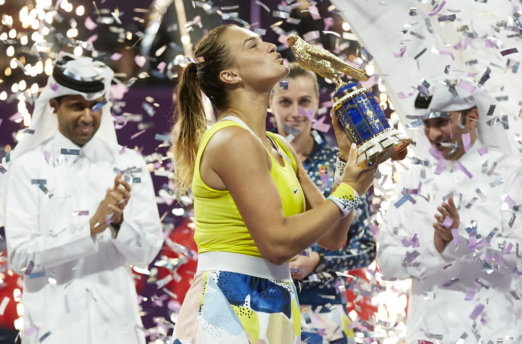 Aryna Sabalenka of Belarus celebrates with the trophy following he win in the Women's Singles Final match against Petra Kvitova of Czech Republic of the WTA Qatar Total Open 2020 at Khalifa International Tennis and Squash Complex on February 29, 2020 in Doha, Qatar.