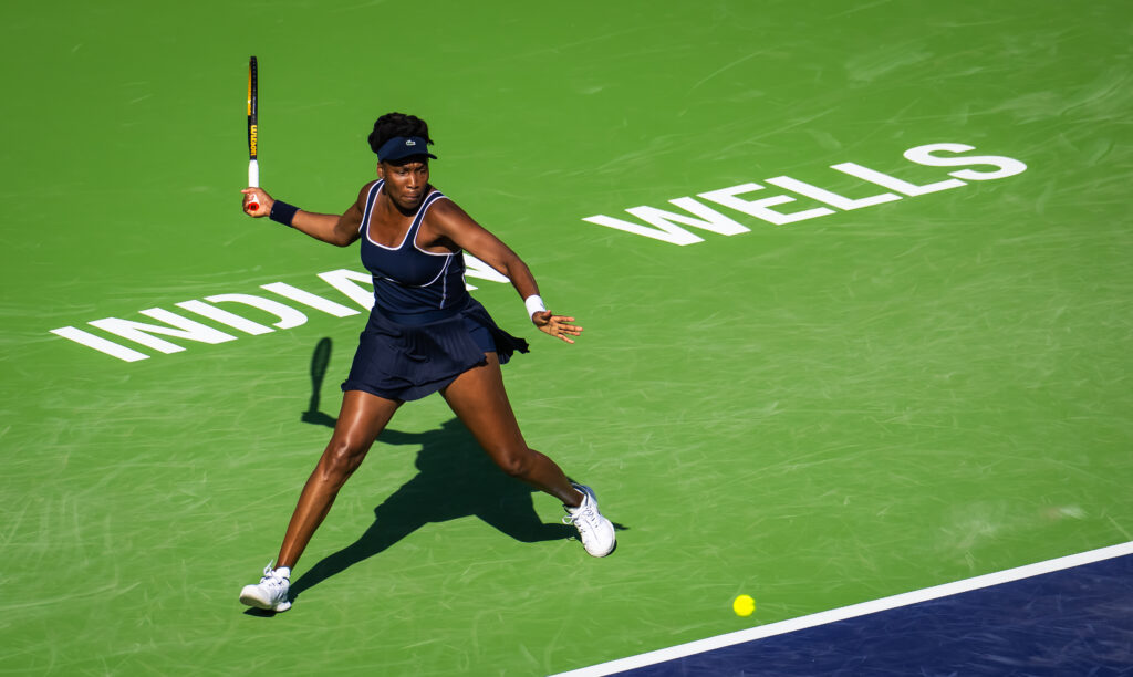 Venus Williams of the United States in action against Nao Hibino of Japan in the first round on Day 5 of the BNP Paribas Open at Indian Wells Tennis Garden on March 07, 2024 in Indian Wells, California