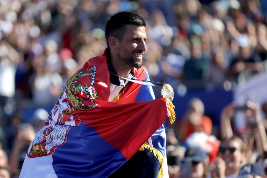 Men's Tennis Singles gold medalist Novak Djokovic of Team Serbia poses for a photo with his medal at Champions Park on day ten of the Olympic Games Paris 2024 on August 05, 2024 in Paris, France.