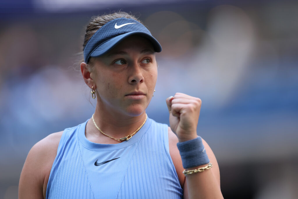 Amanda Anisimova of the United States reacts while playing against Iga Swiatek of Poland during the Women's Quarterfinal match on Day Eleven of the 2025 US Open at USTA Billie Jean King National Tennis Center on September 3, 2025 in the Flushing neighborhood of the Queens borough of New York City.