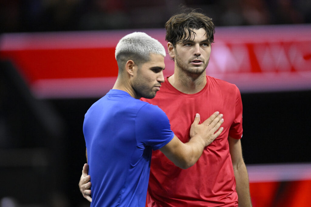 Taylor Fritz of Team World (R) greets Carlos Alcaraz of Team Europe following their match during day two of Laver Cup 2025 at Chase Center on September 20, 2025 in San Francisco, California.