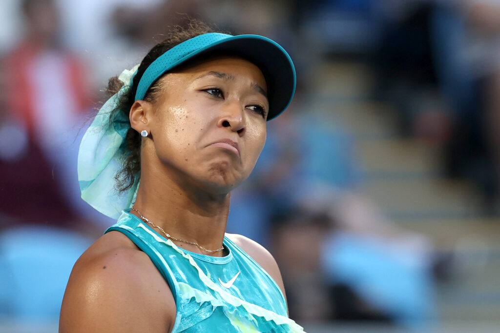 Naomi Osaka of Japan reacts in the Women's Singles Second Round against Sorana Cirstea of Romania during day five of the 2026 Australian Open at Melbourne Park on January 22, 2026 in Melbourne, Australia.