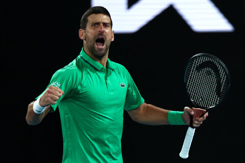 Serbia's Novak Djokovic reacts after a point against Spain's Carlos Alcaraz during their men's singles final match on day fifteen of the Australian Open tennis tournament in Melbourne on February 1, 2026.
