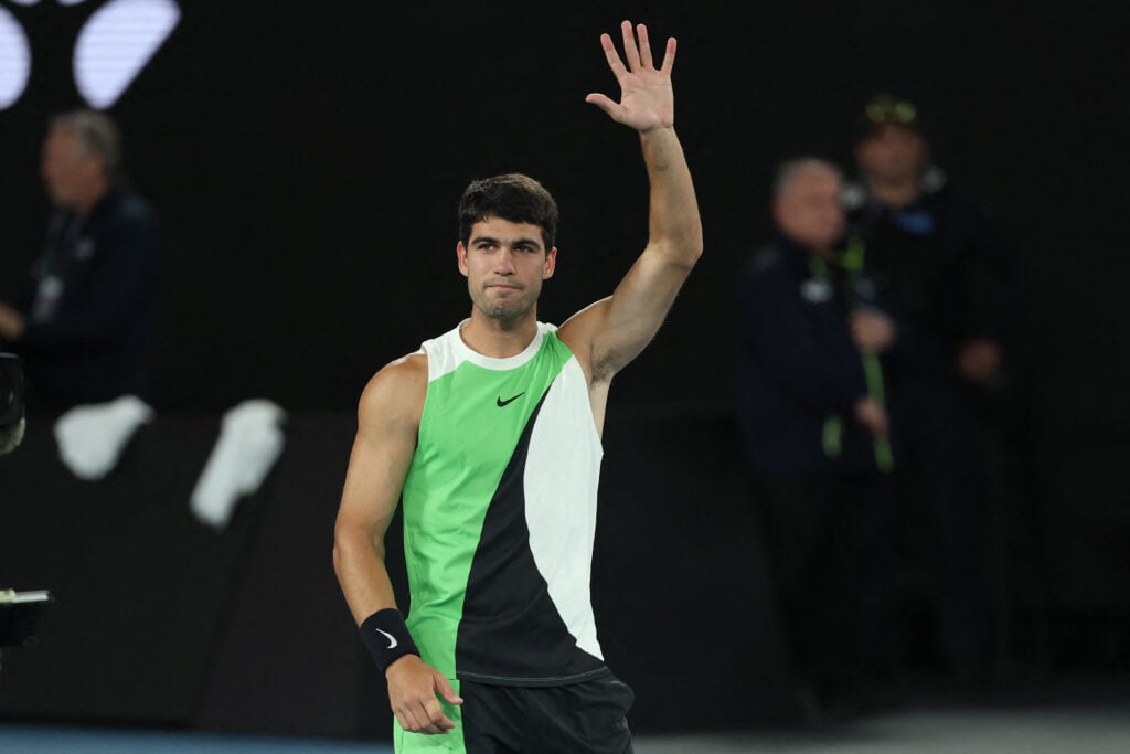 Spain's Carlos Alcaraz celebrates victory over Serbia's Novak Djokovic after their men's singles final match on day fifteen of the Australian Open tennis tournament in Melbourne on February 1, 2026.