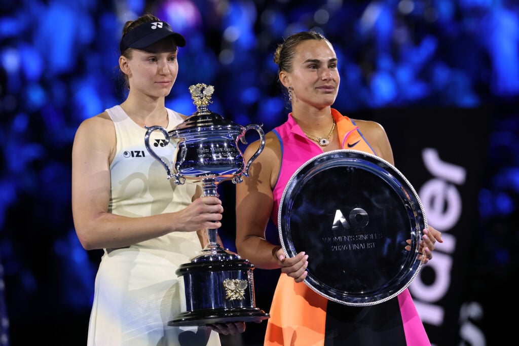 Winner Elena Rybakina (L) of Kazakhstan poses with runner-up Aryna Sabalenka (R) after the Women's Singles Final during day 14 of the 2026 Australian Open at Melbourne Park on January 31, 2026 in Melbourne, Australia. (