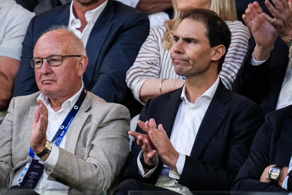 Rafael Nadal of Spain watches the Men's Singles Final between Carlos Alcaraz of Spain and Novak Djokovic of Serbia during day fifteen of the 2026 Australian Open at Melbourne Park on February 01, 2026 in Melbourne, Australia.