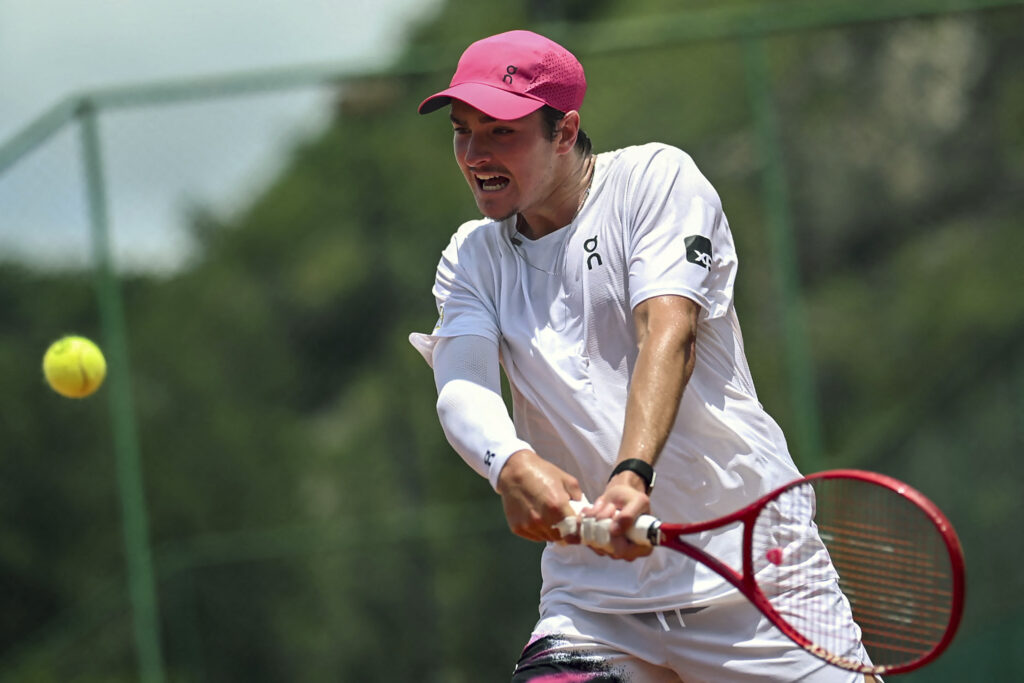 Brazilian tennis player Joao Fonseca gestures as he hits the ball during a training session open to media at the Itanhanga Golf Club in Rio de Janeiro, Brazil, on February 05, 2026.