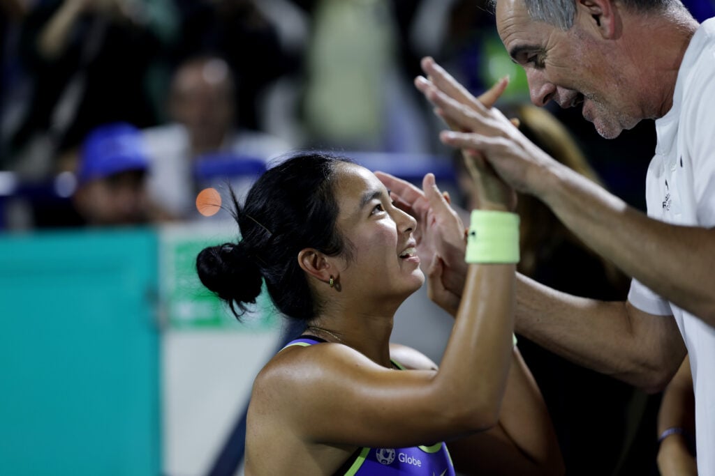 Alexandra Eala of the Philippines embraces her coach Joan Bosch while celebrating victory over Aliaksandra Sasnovich in the second round during day four of the Mubadala Abu Dhabi Open