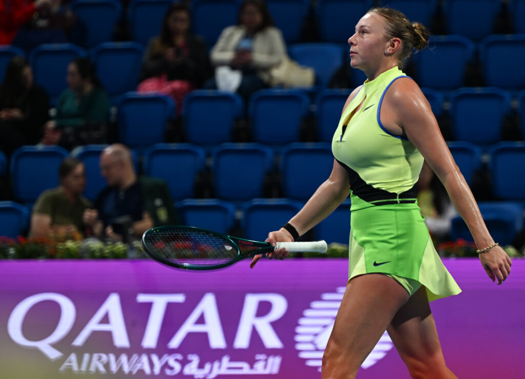 Amanda Anisimova of the United States competes against Karolina Pliskova of the Czechia in the first round on Day Two of the Qatar TotalEnergies Open, part of the Hologic WTA Tour, at the Khalifa International Tennis and Squash Complex on February 9, 2026 in Doha, Qatar.