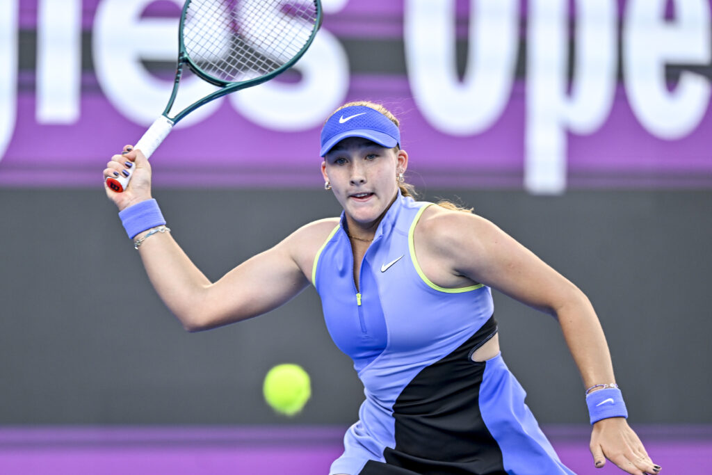 Mirra Andreeva of Russia plays against Victoria Mboko of Canada (not in view) during the round of 16 match at the WTA Qatar TotalEnergies Open 2026 tennis tournament at the Khalifa International Tennis Complex. Victoria Mboko won against Mirra Andreeva 6-3,3-6,7-6.