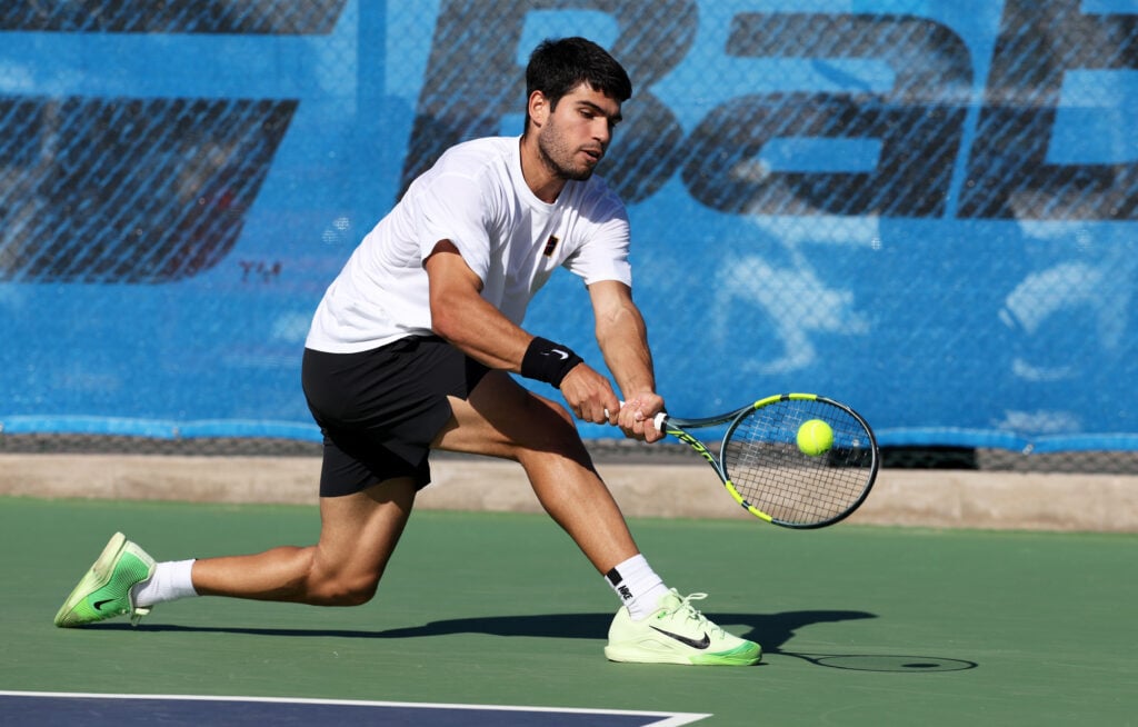 Carlos Alcaraz of Spain plays a backhand during a training session in preparation for the Doha Open at Real Sociedad Club de Campo on February 10, 2026 in Murcia, Spain.