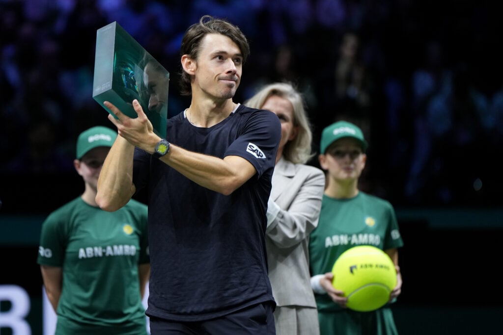 Alex de Minaur of Australia holds the winners trophy after defeating Felix Auger-Aliassime of Canada in the ABN AMRO Open Mens Singles Final at Rotterdam Ahoy on February 15, 2026 in Rotterdam, Netherlands.